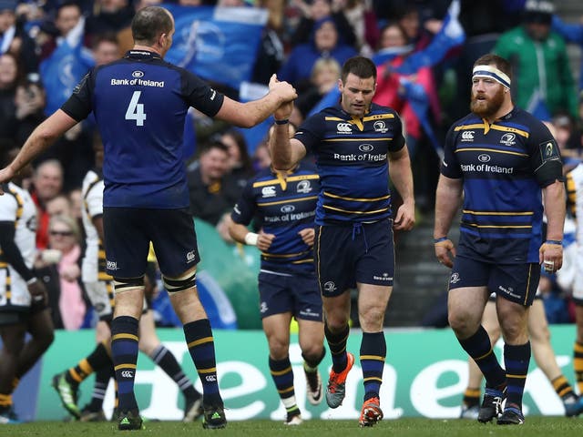 Fergus McFadden is congratulated by Devin Toner (L) after scoring for Leinster