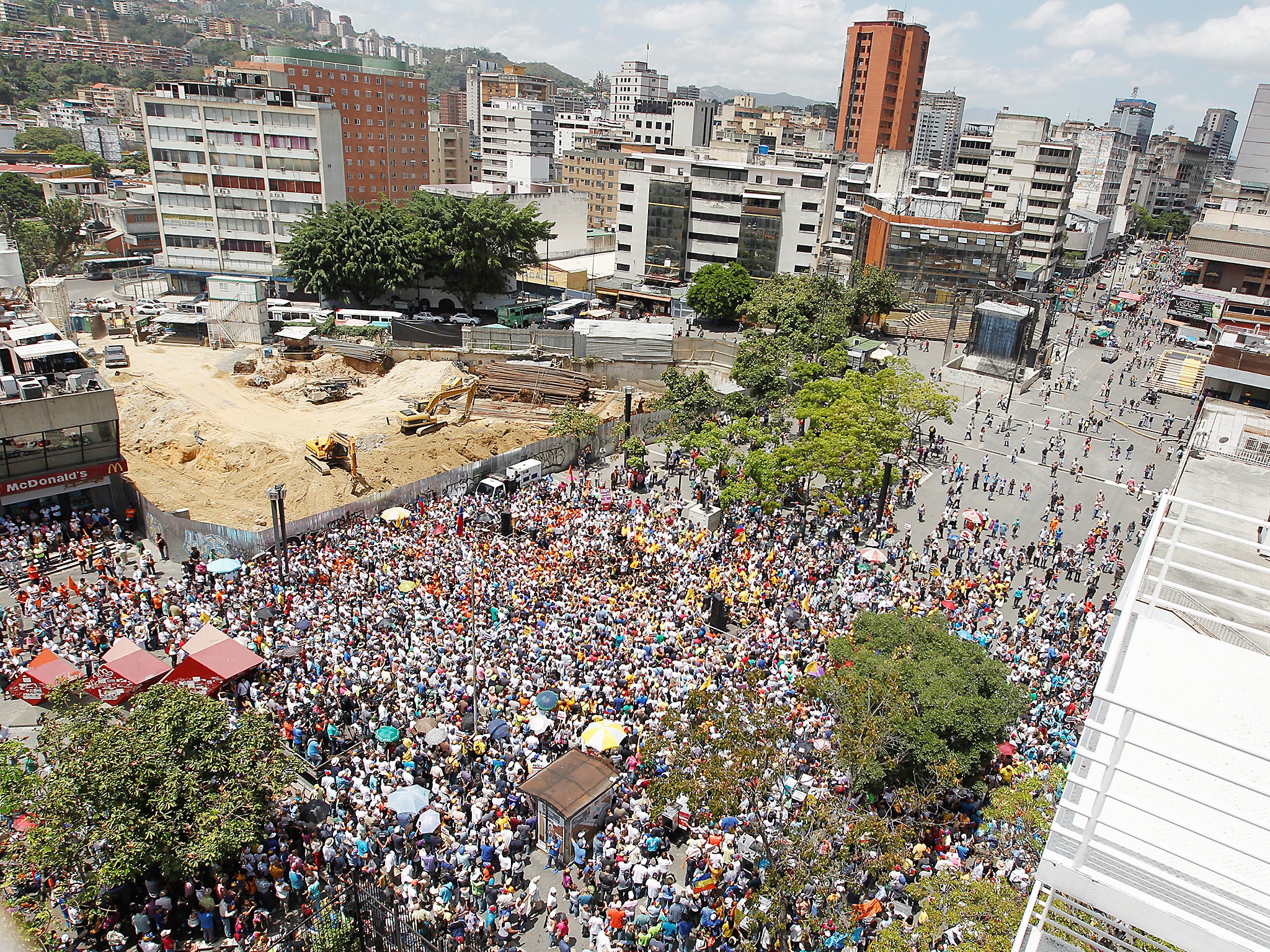 Opposition supporters protest against the government during a rally in Caracas this month