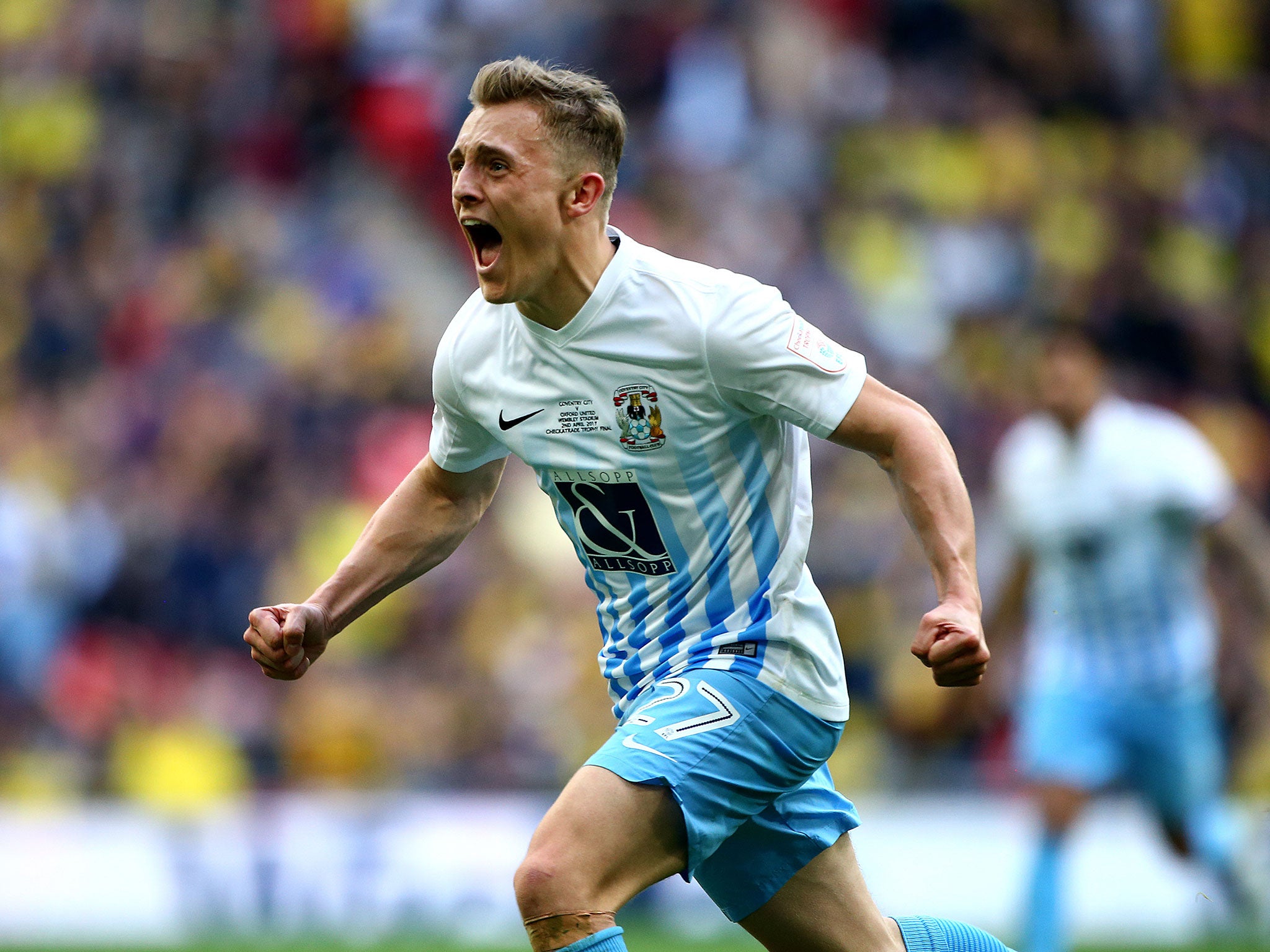 George Thomas celebrates after scoring Coventry's second goal in the EFL Checkatrade Trophy Final