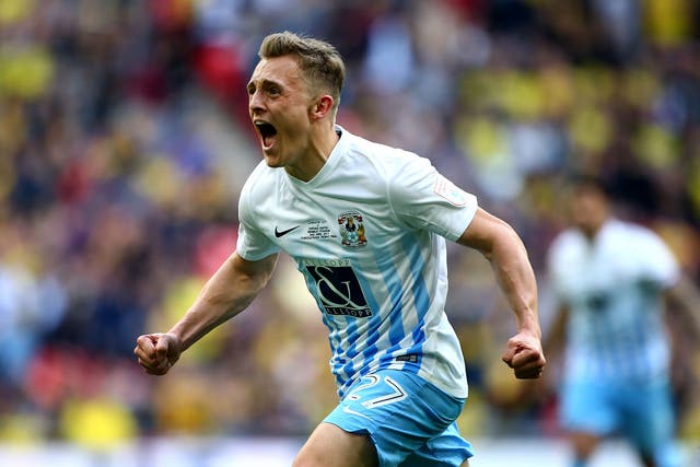 George Thomas celebrates after scoring Coventry's second goal in the EFL Checkatrade Trophy Final