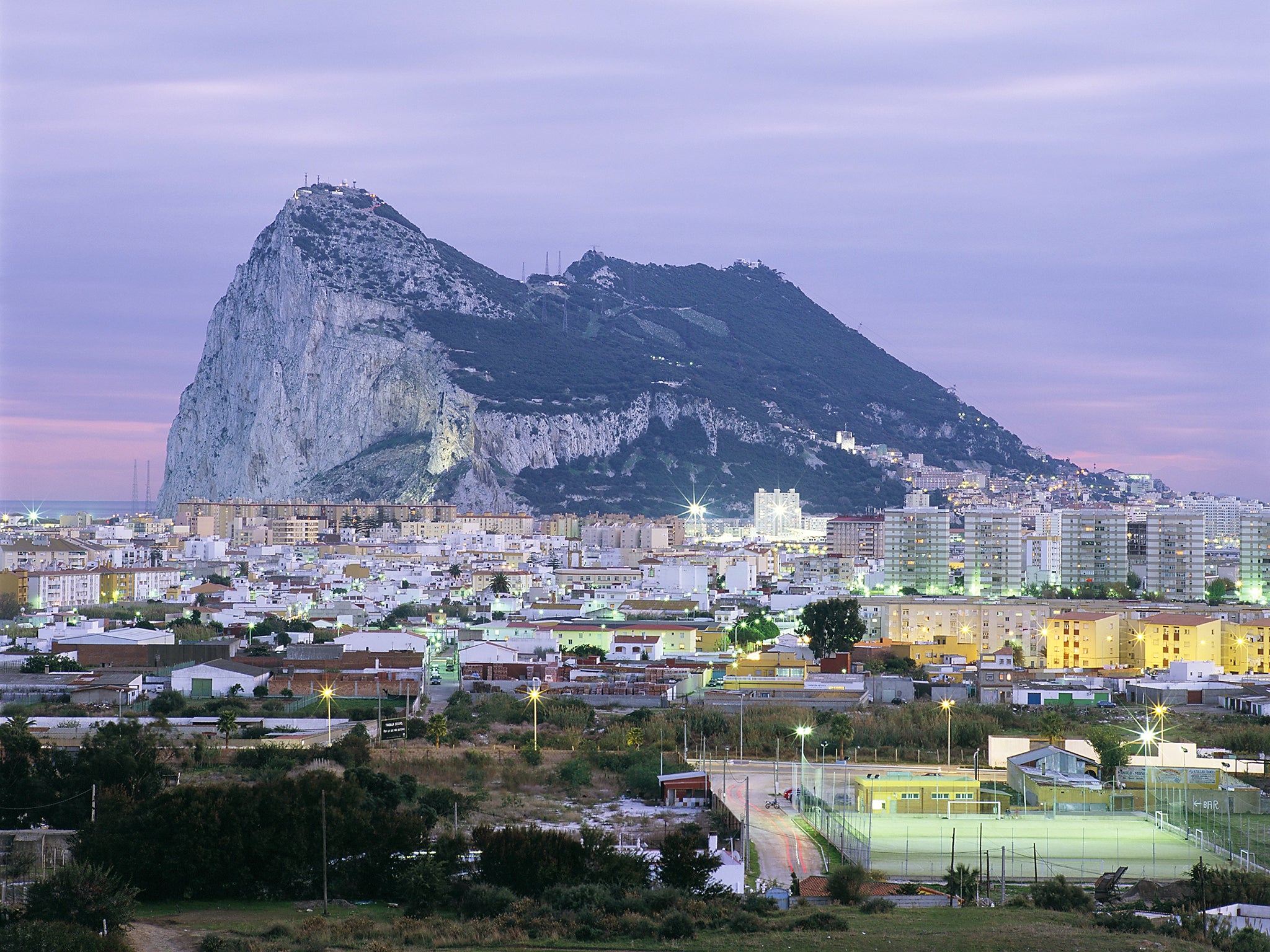 La Línea, seen here in the foreground with the Rock of Gibraltar behind, has lost three generations of young people to drug trafficking, according to Francisco Mena