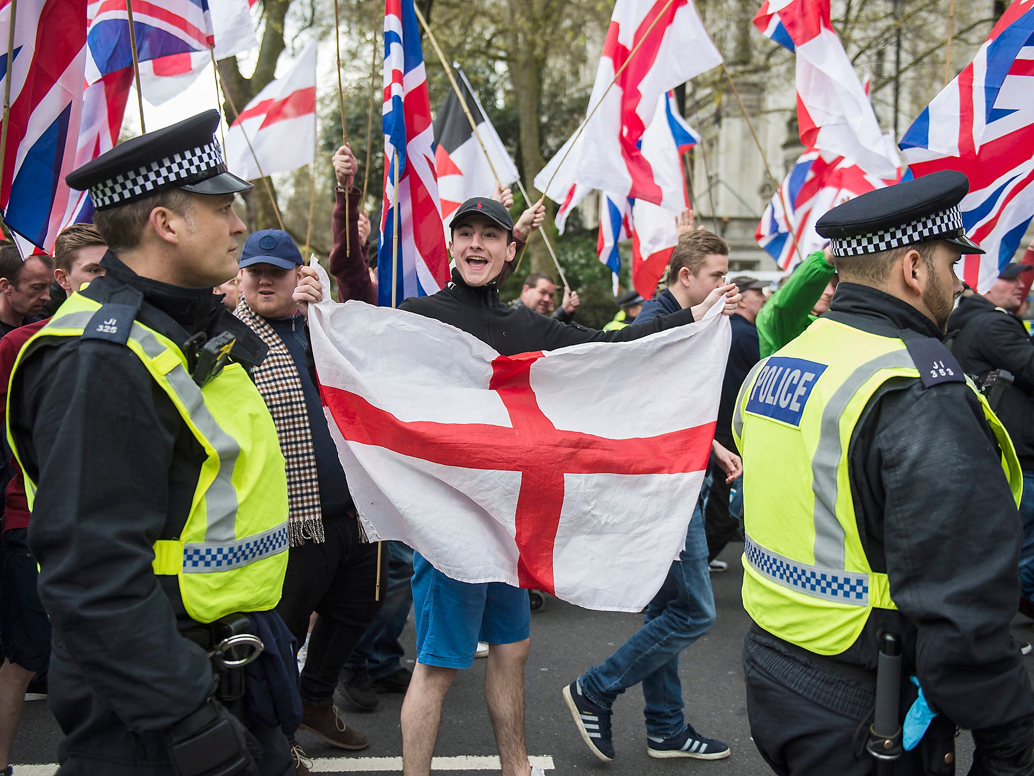 Britain First and EDL (English Defence League) protesters walk along Northumberland Avenue during a demonstration in London