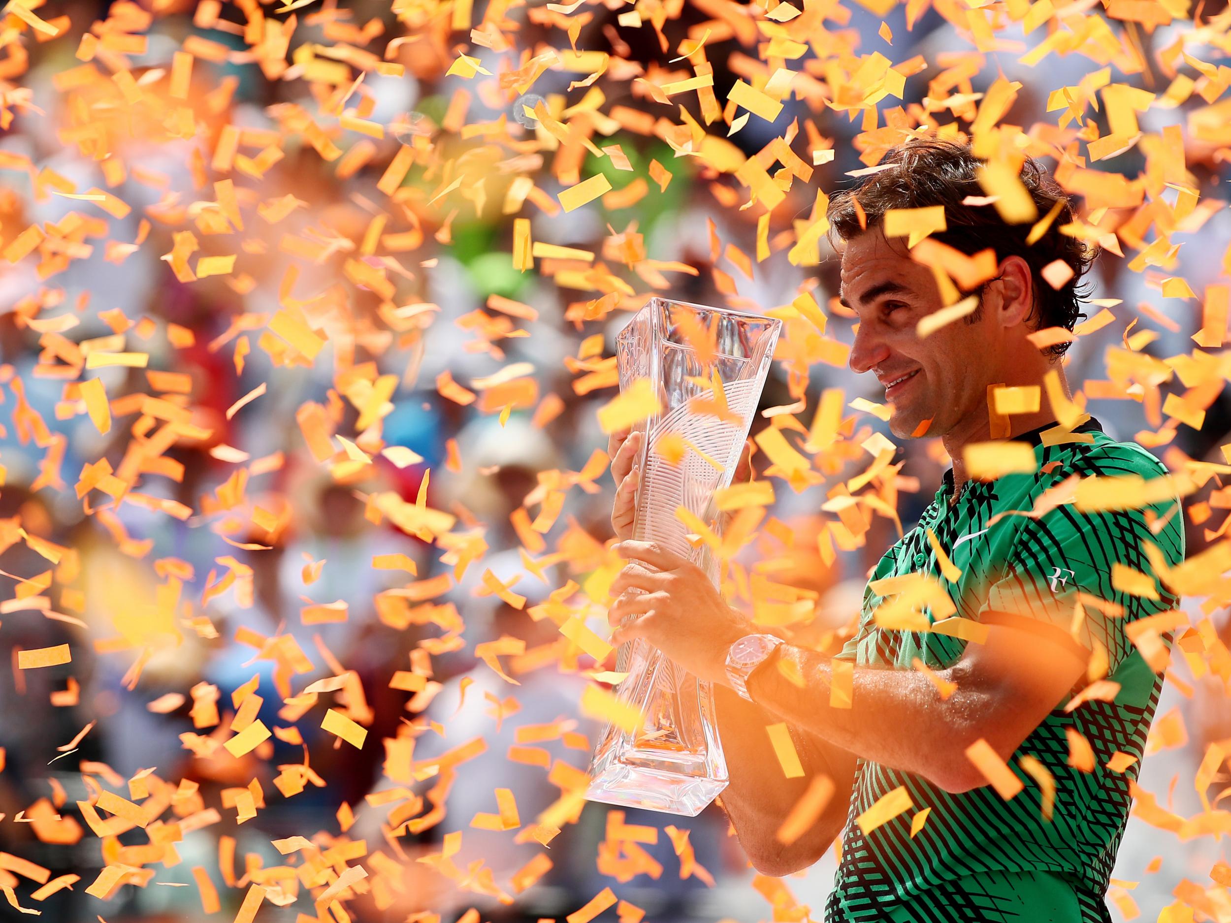 Federer celebrates his third Miami Open title