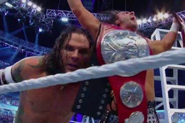 Jeff and Matt Hardy celebrate winning the raw Tag Team titles