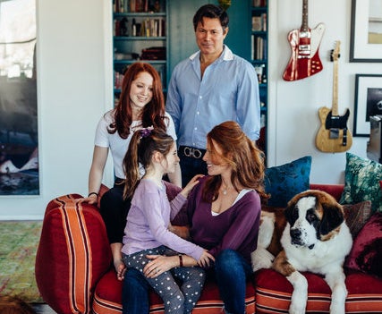 Isabel Rose with her husband and two daughters (Sasha Arutyunova/ The New York Times)