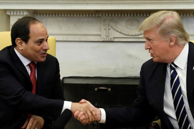 Mr Trump shakes hands with 'fantastic guy' Abdel Fattah al-Sisi at the White House last month