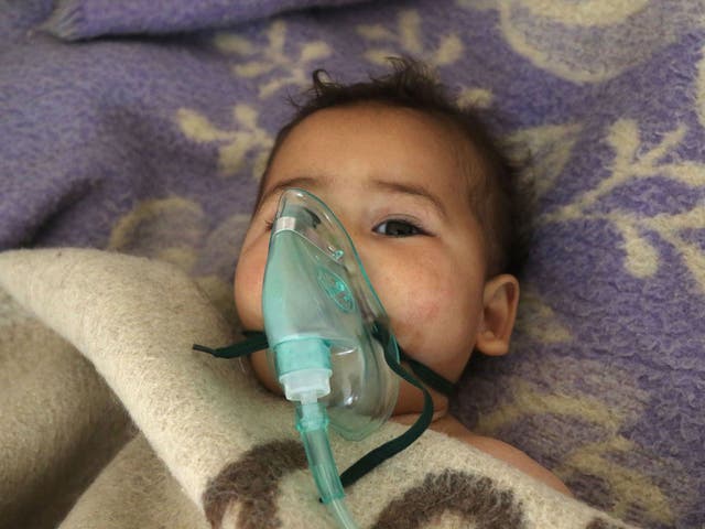 A Syrian child receives treatment following a suspected gas attack in Khan Sheikhoun, a rebel-held town in the northwestern Syrian Idlib province, on 4 April