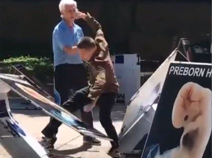 Man attacks anti-abortion signs at Texan university