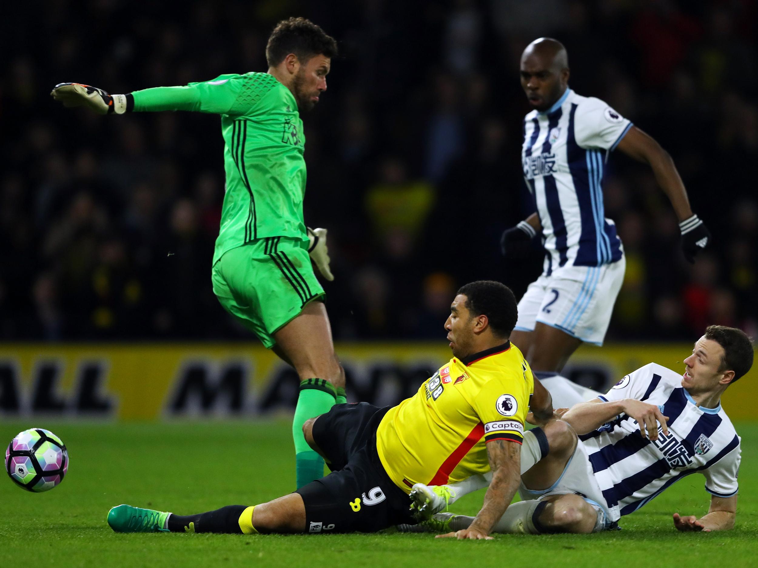 Deeney bundles the ball past Foster to help win Watford all three points