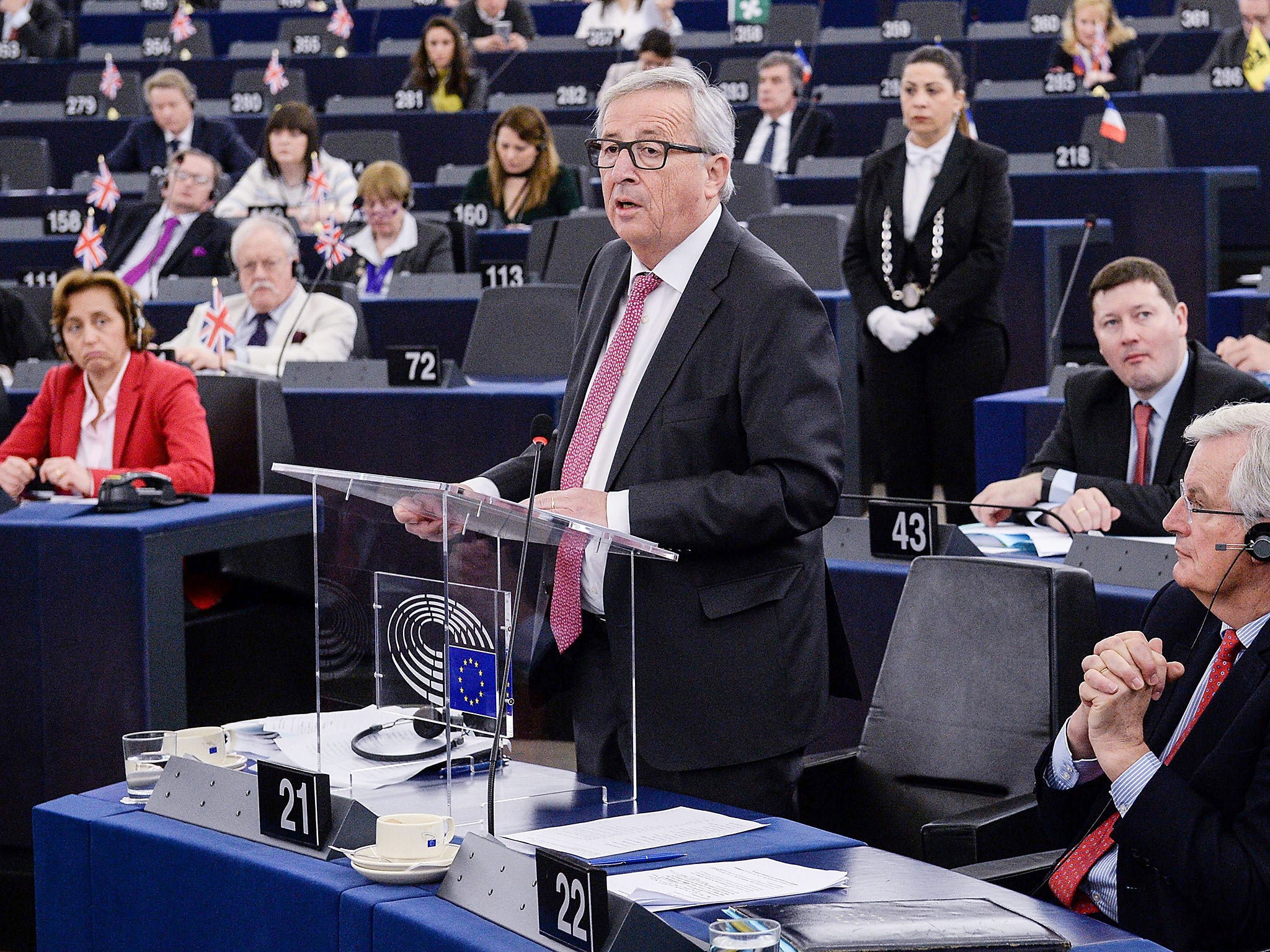 &#13;
Michel Barnier listens as the President of the European Commission Jean-Claude Juncker speaks at the European Parliament in Strasbourg &#13;