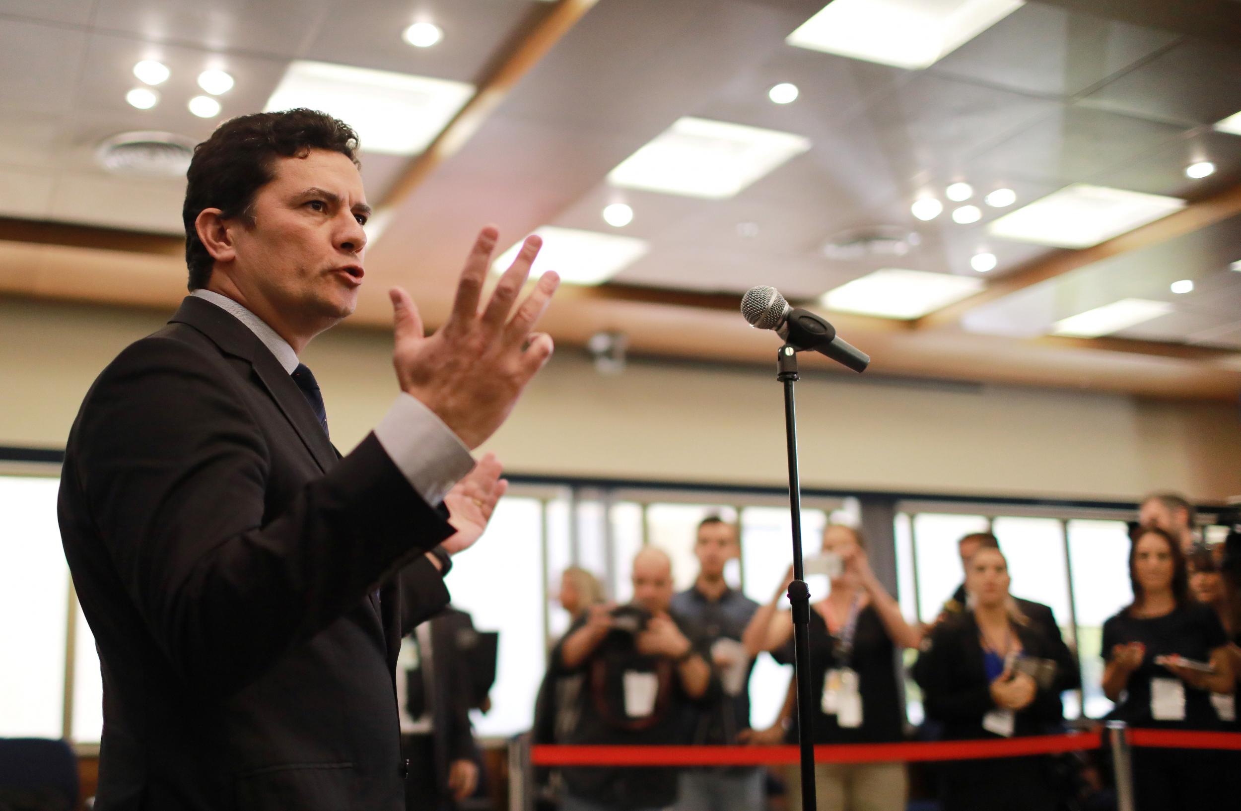 Brazilian federal judge Sergio Moro talks to journalists, as he arrives for the wake of the Brazilian Supreme Court Justice Teori Zavascki, in Porto Alegre on January 2 2017