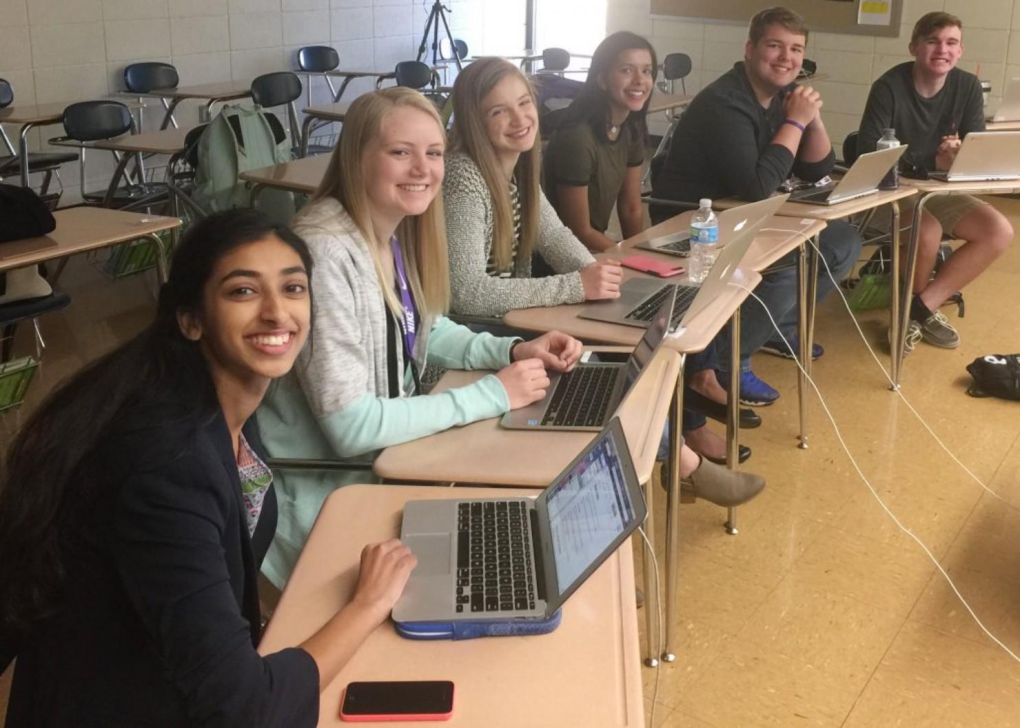 Gina Mathew, Kali Poenitske, Maddie Baden, Trina Paul, Connor Balthazor and Patrick Sullivan prepare to Skype with newly hired principal Amy Robertson.