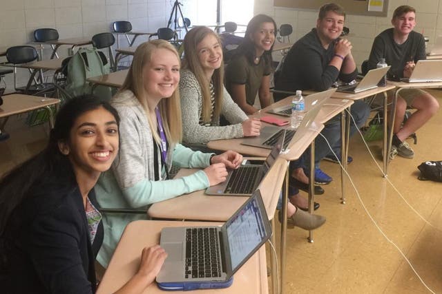 Gina Mathew, Kali Poenitske, Maddie Baden, Trina Paul, Connor Balthazor and Patrick Sullivan prepare to Skype with their then school principal, Amy Robertson, who was at the centre of their investigation