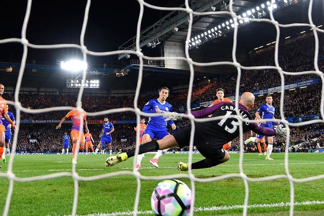 Hazard tucks home the winner after Caballero saved his penalty