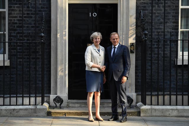 Theresa May greets Donald Tusk in Downing Street at a previous meeting in September last year