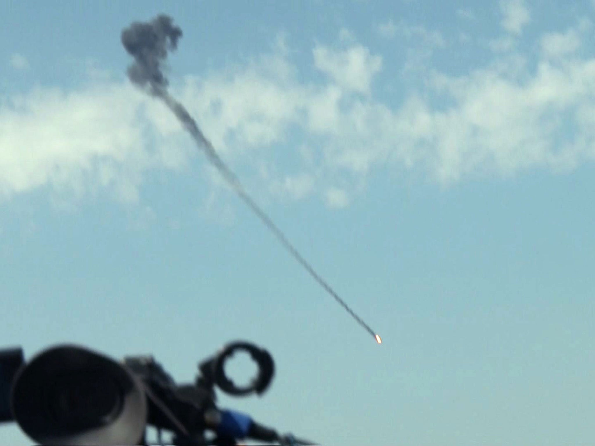An Iraqi helicopter being shot down in Mosul on 6 April