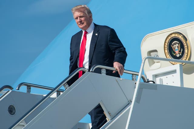 President Trump arrives at Palm Beach International Airport in Florida to spend the weekend at his Mar-a-Lago resort