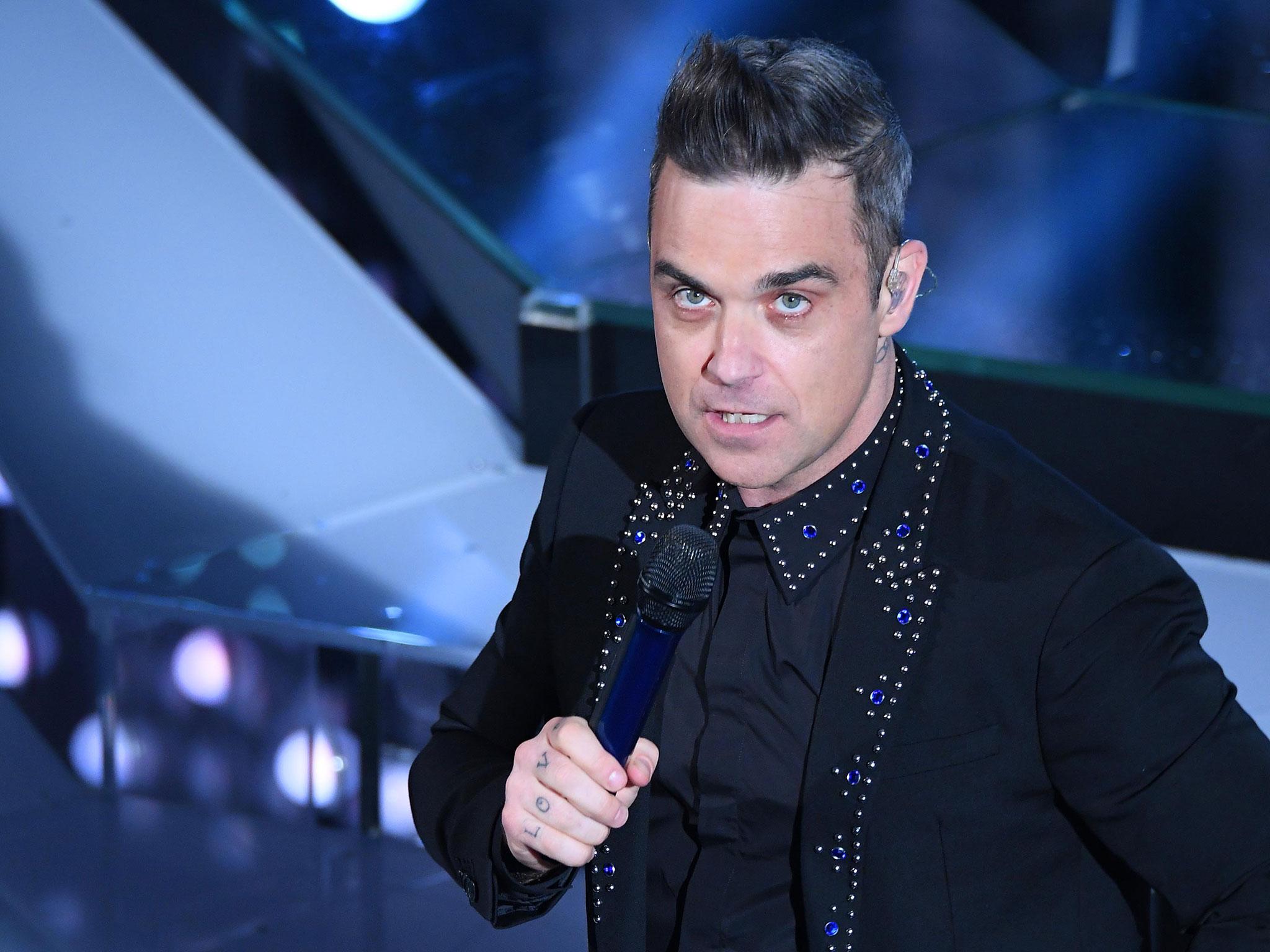 The management team behind Robbie Williams, ie:music, came under fire for placing tickets directly onto GetMeIn and Seatwave in January 2017 (Rex)