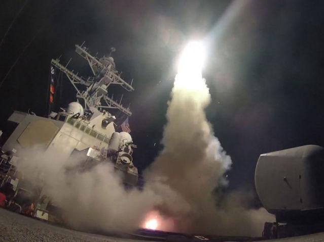 The US Navy of USS Porter fires a tomahawk land attack missile from the Mediterranean Sea, as the world mostly welcomed American strikes on Syrian government targets