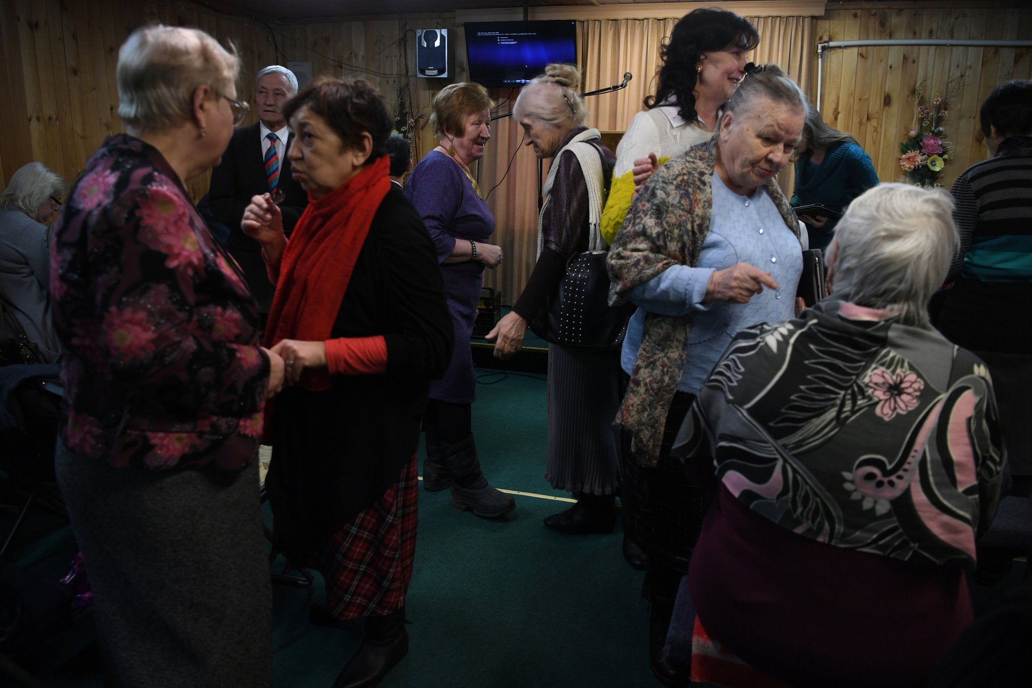 Jehovah’s Witnesses gather in a house in the village of Vorokhobino, north of Moscow, where they meet for services (Pictures by James Hill/New York Times)