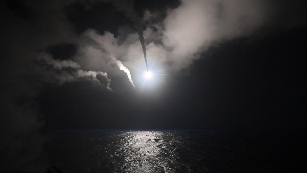 In this handout provided by the US Navy, the guided-missile destroyer USS Porter fires a Tomahawk land attack missile towards a Syrian government military position on April 7, 2017 from the Mediterranean Sea