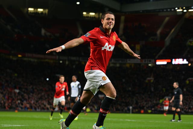 Hernandez celebrates scoring for United during a League Cup clash with Norwich in 2013