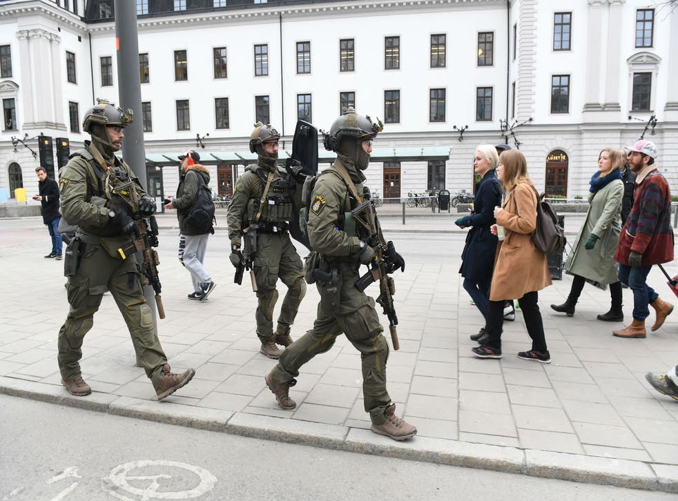 Police patrolling outside Stockholm Central station yesterday