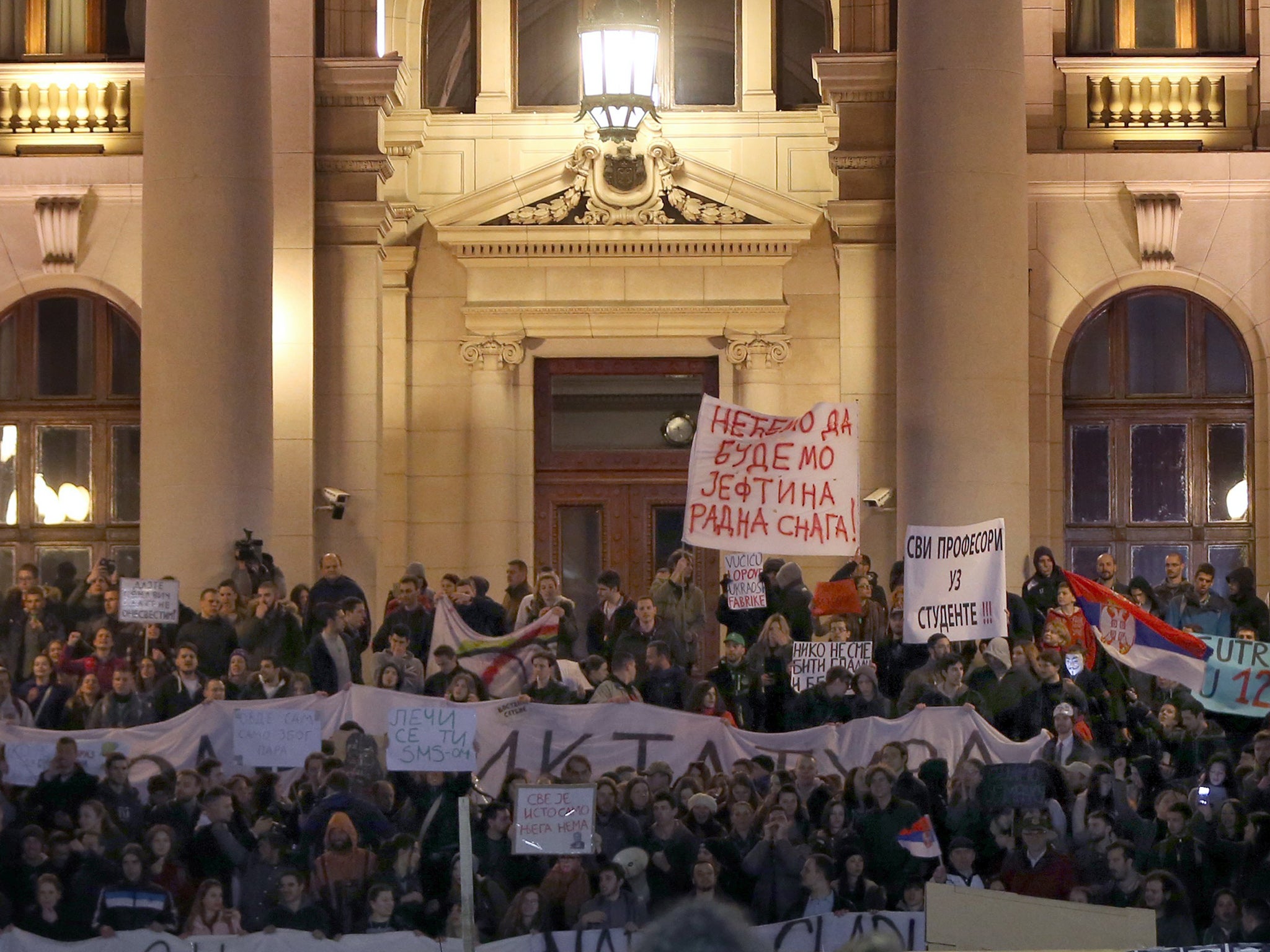 Protesters gather outside the National Assembly of Serbia on Friday denouncing the election victory of Aleksander Vučić