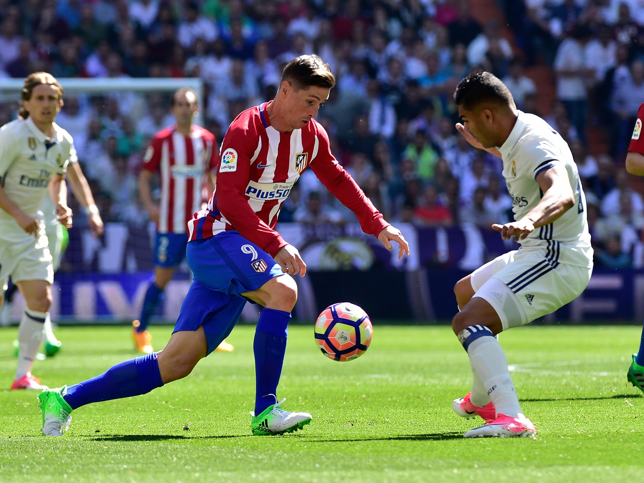 Fernando Torres attempts to beat Casemiro during the early stages