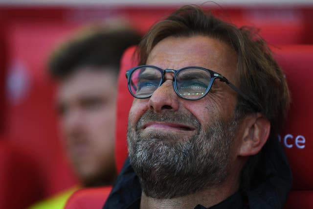 Klopp watches the first-half with a pained expression on his face