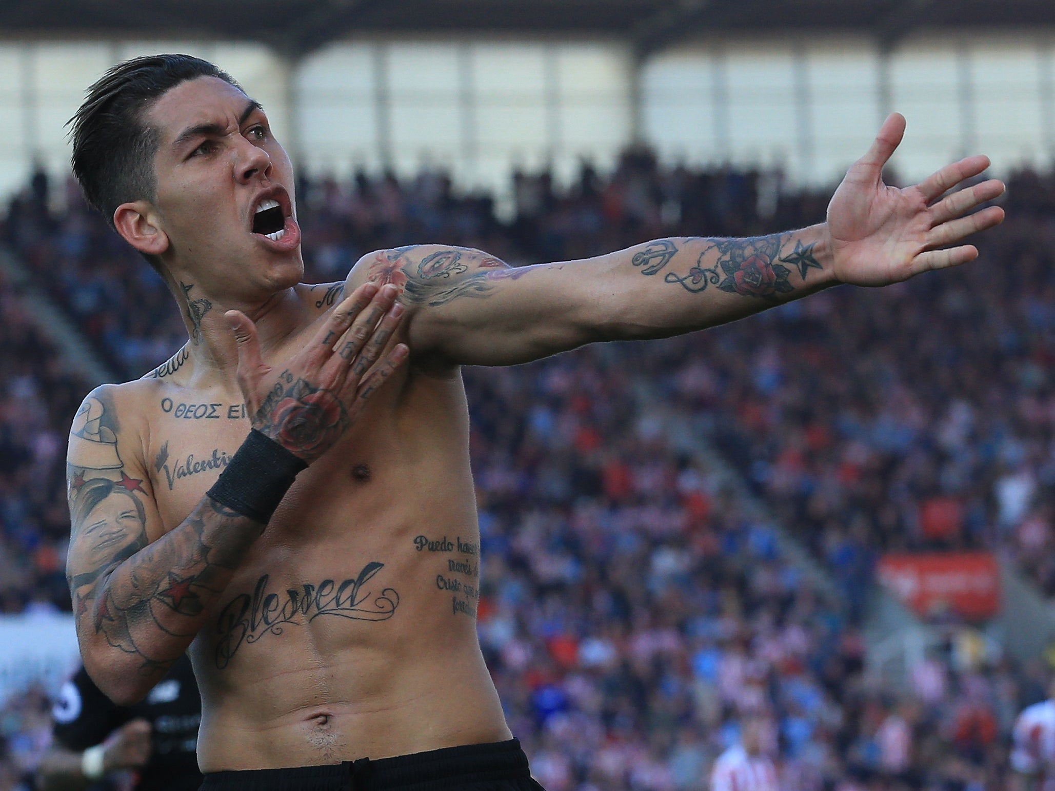 Firmino celebrates his late winner, having started the match on the bench