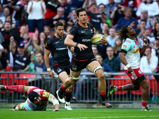 Michael Rhodes crosses the line to score Saracens' third try of the day