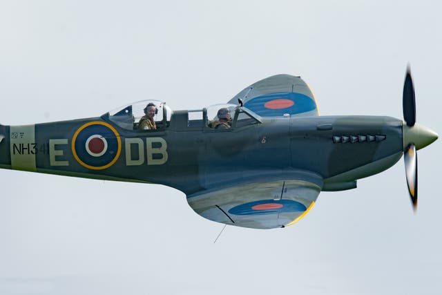 <p>A stock image of a Spitfire being flown </p>