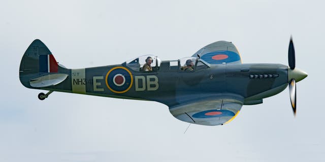 <p>A stock image of a Spitfire being flown </p>