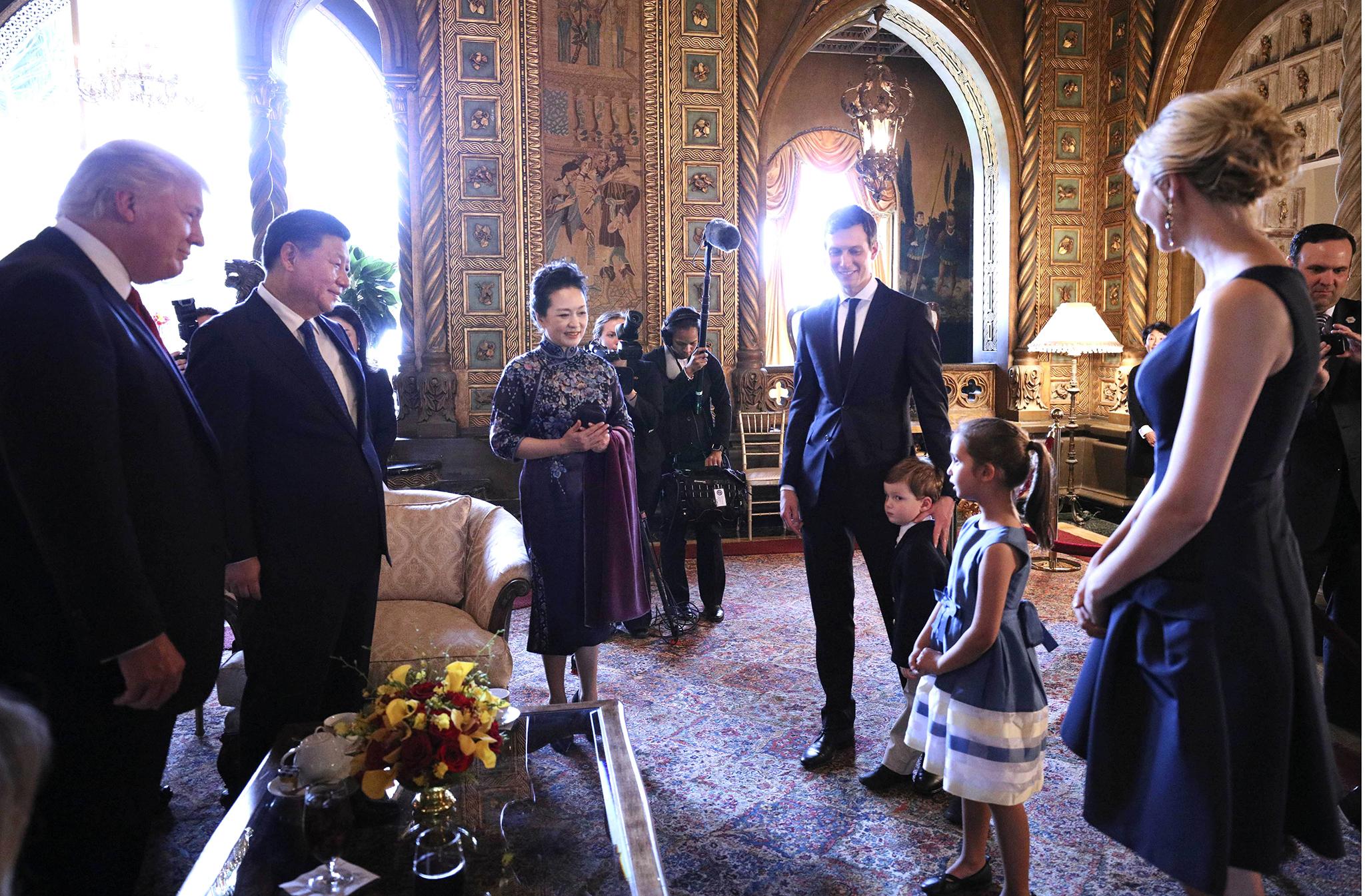 06 Apr 2017 - Chinese President Xi Jinping, his wife Peng Liyuan, and U.S. President Donald Trump listen as Trump's grandchildren sing a Chinese folk song and recite classics of Chinese literature in the Mar-a-Lago resort in Florida Chinese President Xi Jinping visit to USA -