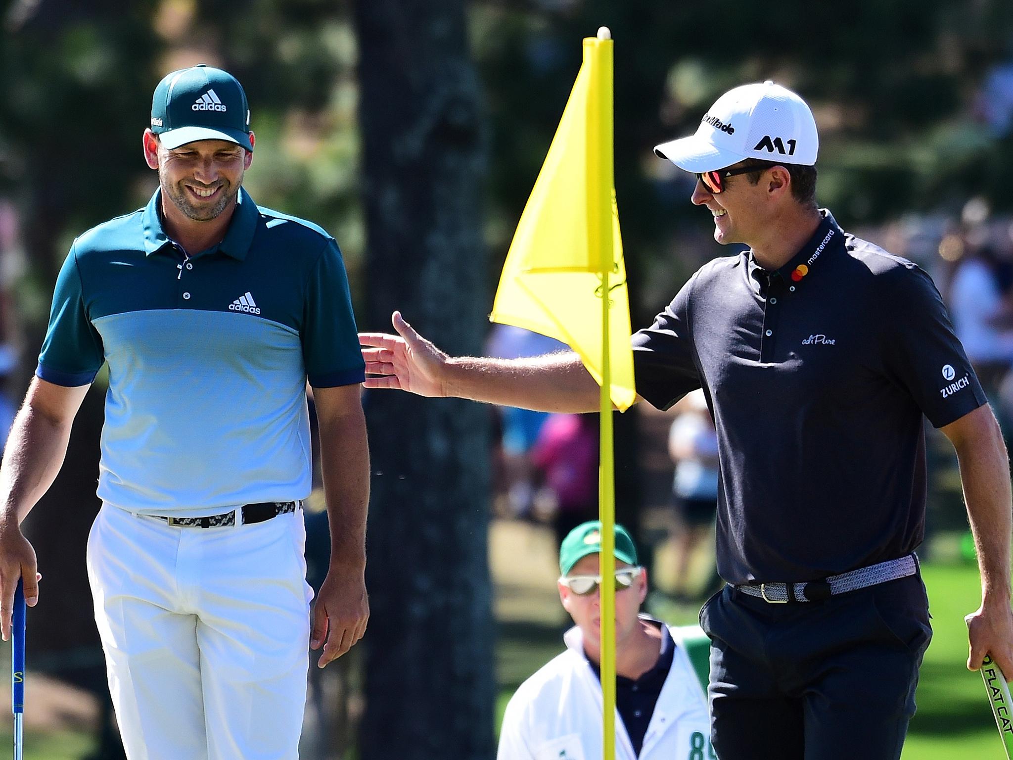 The Spaniard shares a joke with Justin Rose