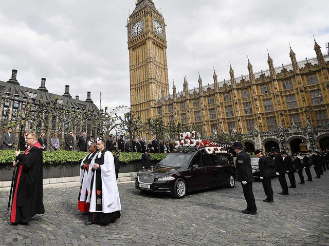 The hearse carrying the coffin of PC Keith Palmer leaves the Chapel of St Mary Undercroft within the Palace of Westminster