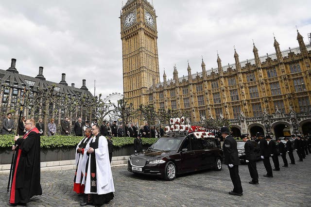 The hearse carrying the coffin of PC Keith Palmer, leaves the Chapel of St Mary Undercroft within the Palace of Westminster in central London, en route to Southwark Cathedral