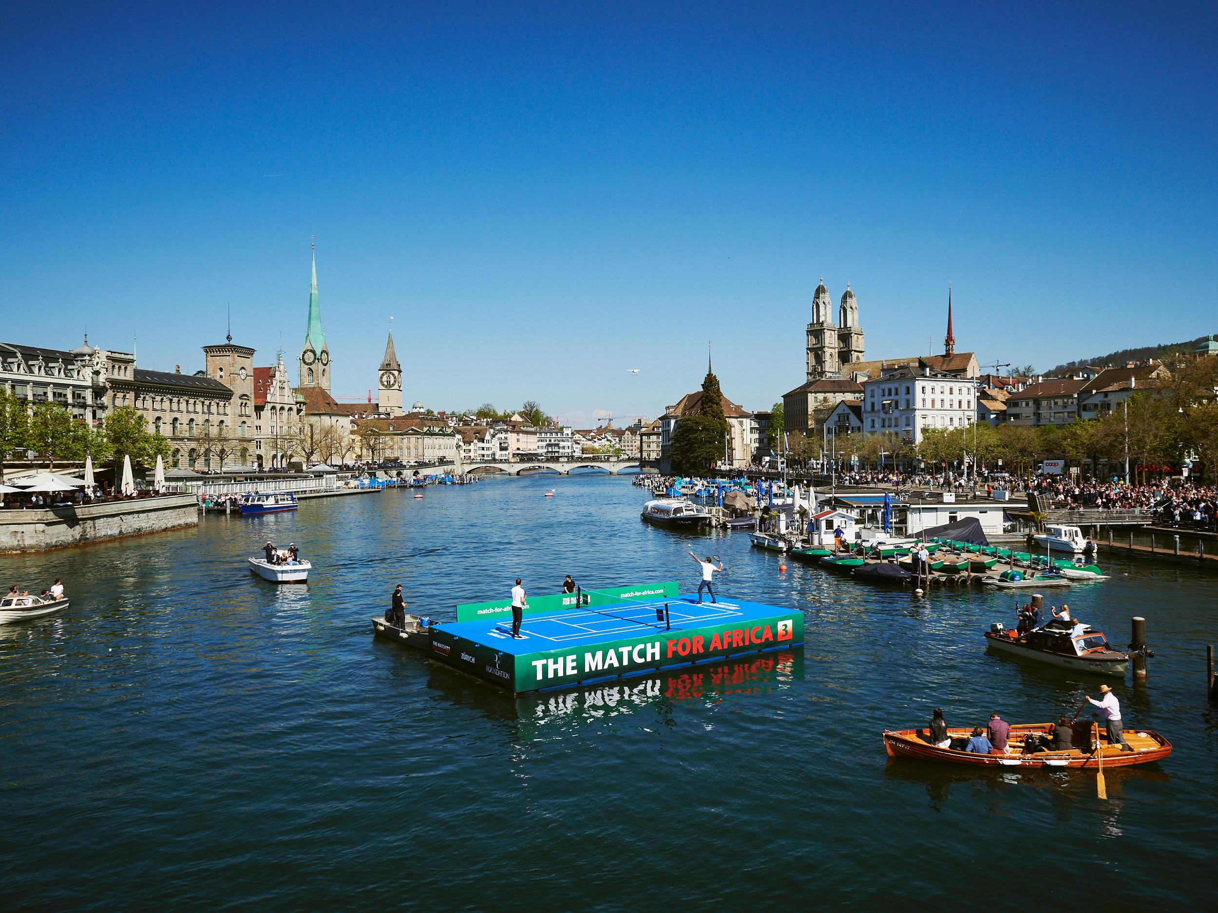 Swiss tennis superstar Roger Federer serves a ball to world number one Andy Murray.