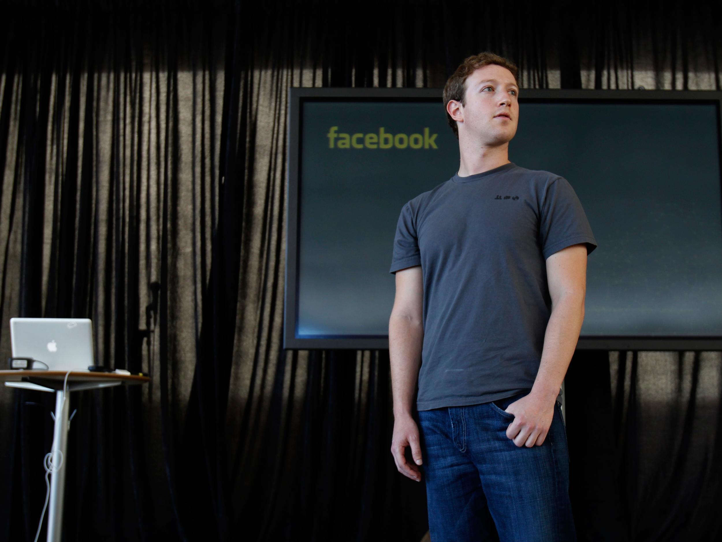 Facebook CEO Mark Zuckerberg listens to a question after introducing a new messaging system during a news conference in San Francisco, California November 15, 2010
