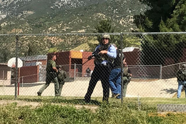 Emergency crews respond to the shooting inside North Park School Elementary School, in San Bernadino, California