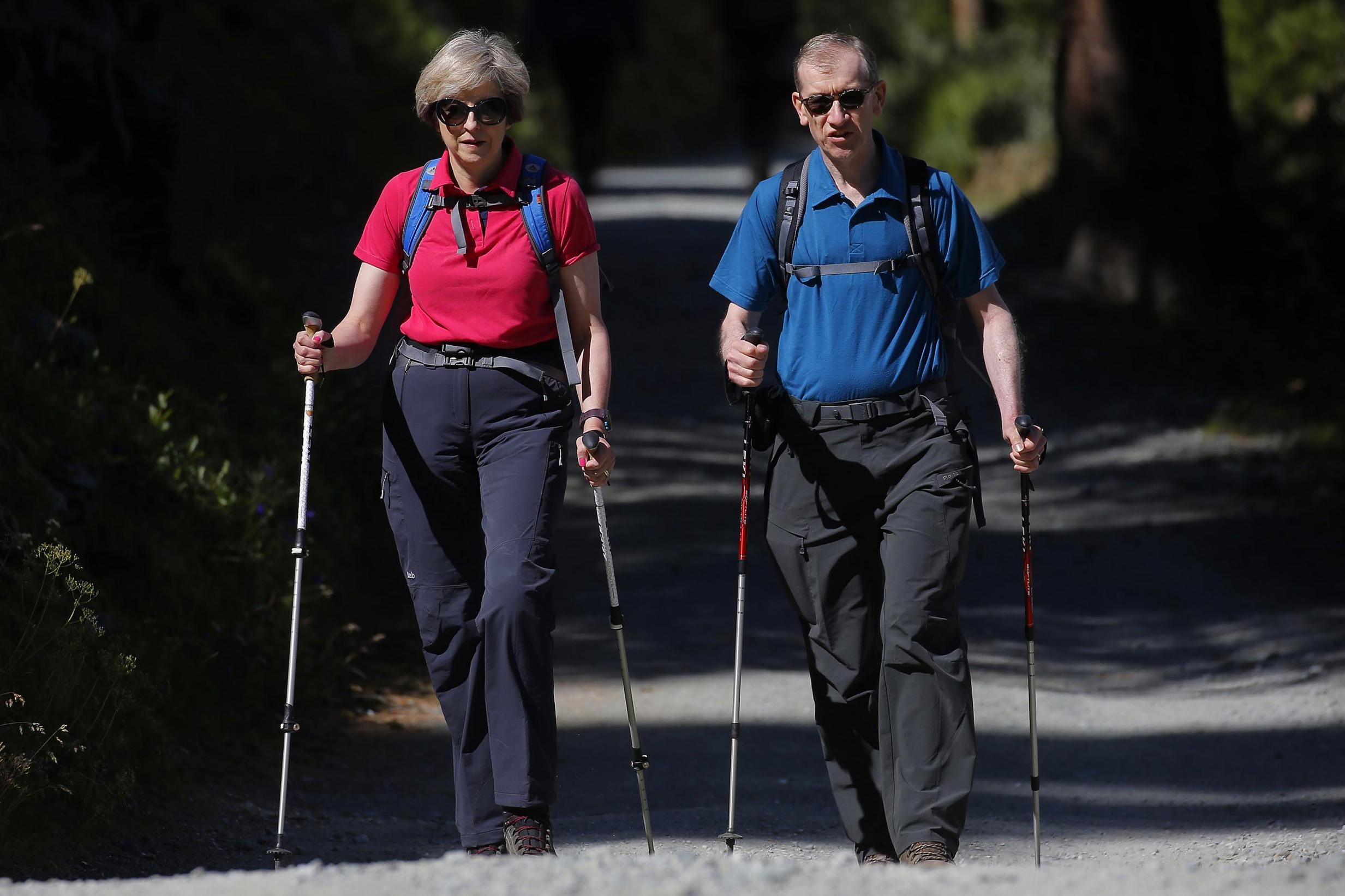 Ms May with her husband, Philip, in Snowdonia