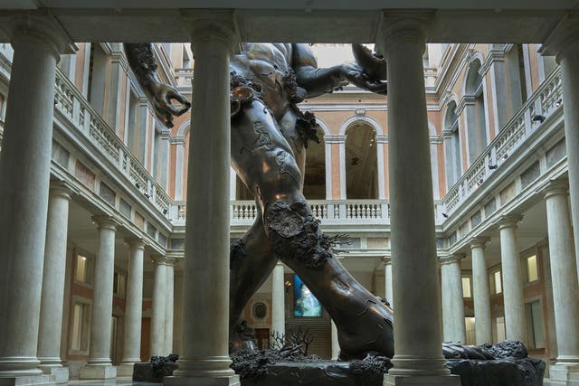 Damien Hirst’s ‘Demon with Bowl’ In the large atrium of Venice's Palazzo Grassi