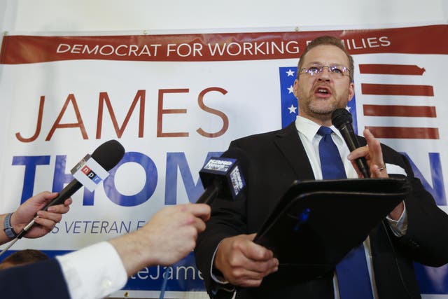 Democratic candidate James Thompson concedes defeat after an unexpectedly close contest with Republican Ron Estes