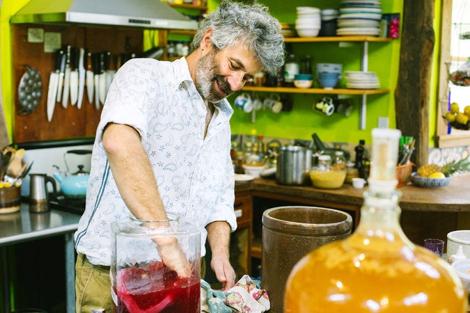 &#13;
Sandor Katz, author of Wild Fermentation, at work in the kitchen (Kyle Dean Reinford/NYT)&#13;