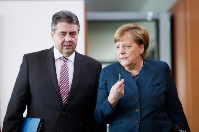 Mr Gabriel (above, with Angela Merkel) foresaw a ‘new, closer form of customs union’ with Turkey