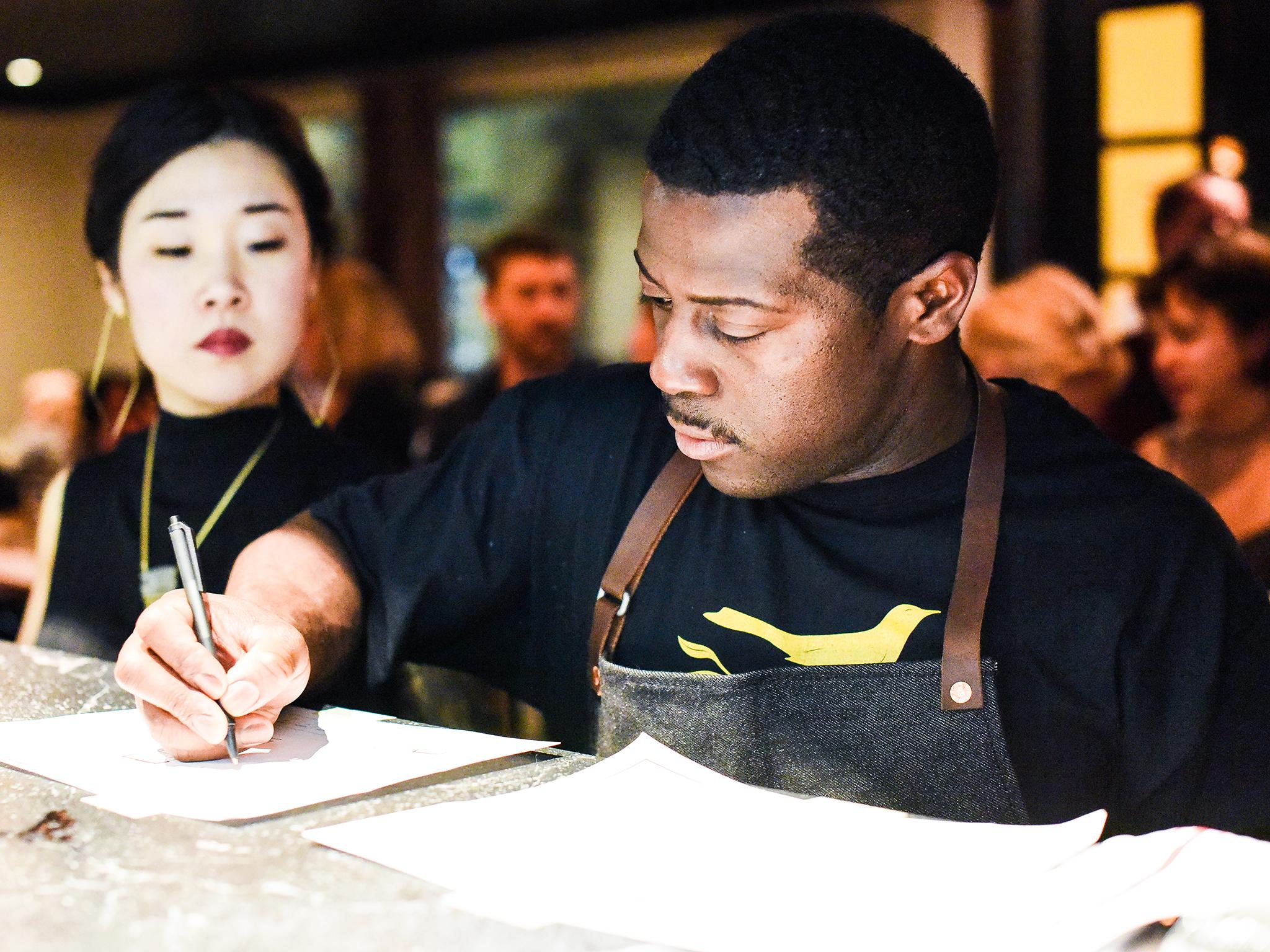 Junebaby's kitchen staff at work before the restaurant opens officially