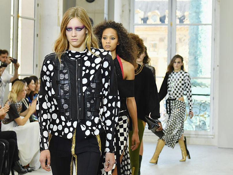 At Louis Vuitton, the classic print was matched with monochromatic garb