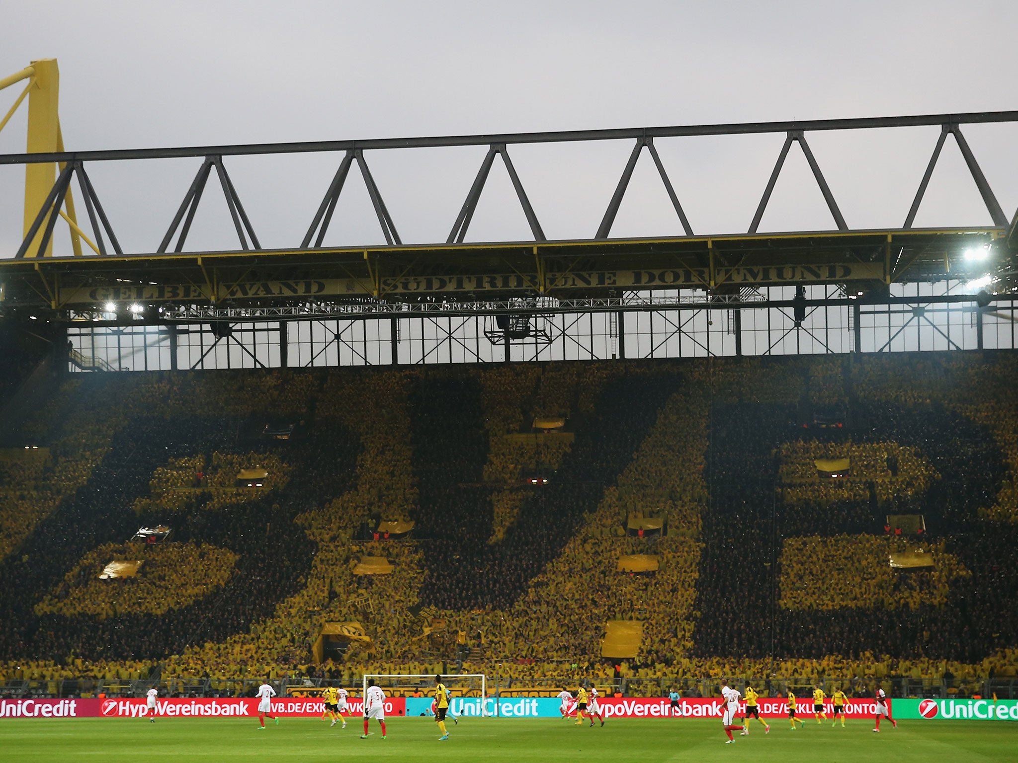 Dortmund take on Monaco 24 hours after the German side's coach was subject to a terrorist attack