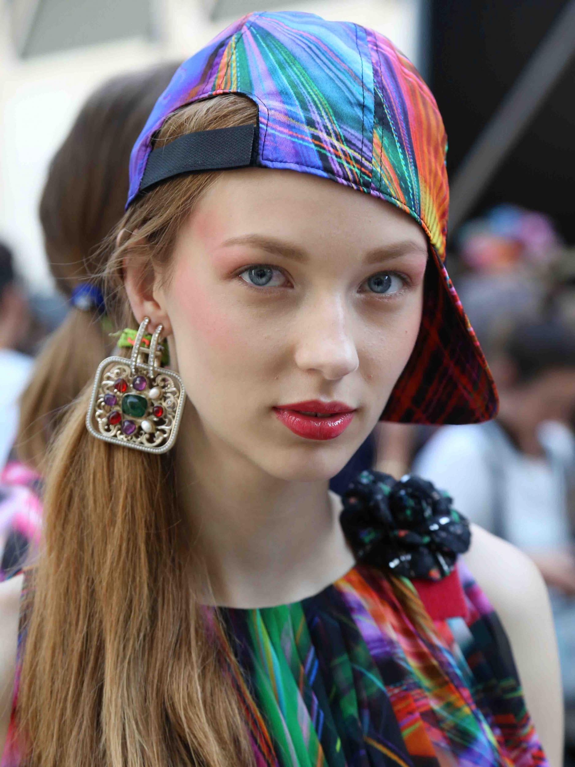 Pink-toned beauty looks saw bold coral lipstick matched to blush at Chanel